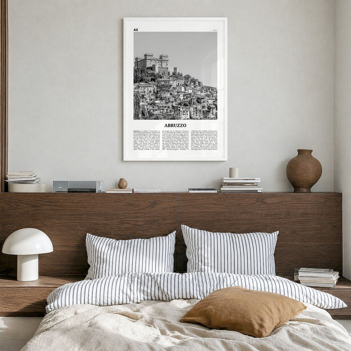 Abruzzo Newspaper No 1 Poster in a white wood frame, hanging in a bedroom