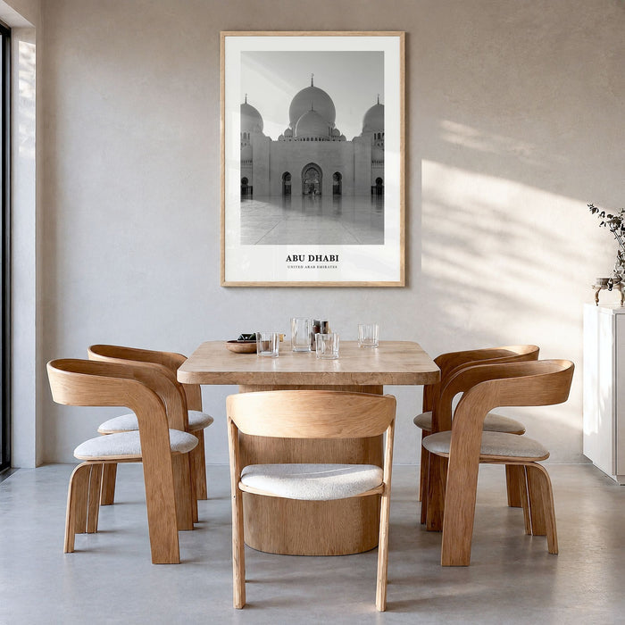 Abu Dhabi Classic Poster in a natural wood frame, hanging in a dining room