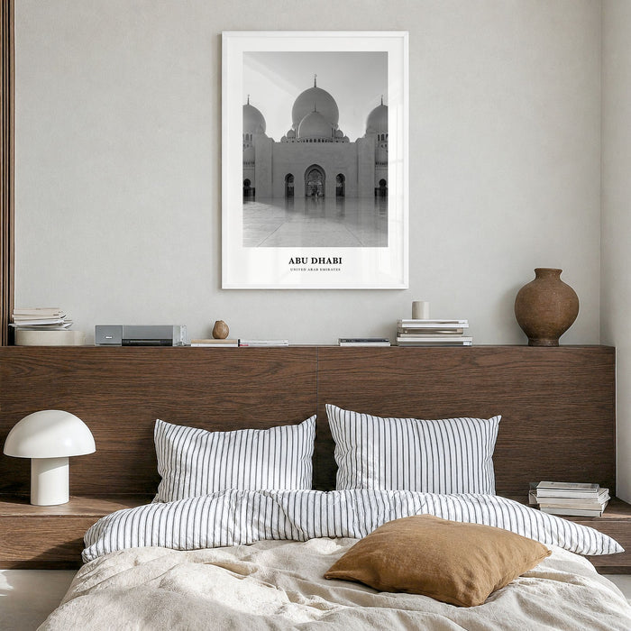 Abu Dhabi Classic Poster in a white wood frame, hanging in a bedroom