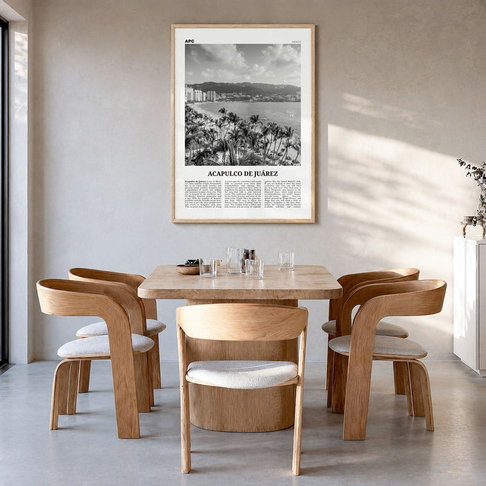 Acapulco Newspaper Poster in a natural wood frame, hanging in a dining room