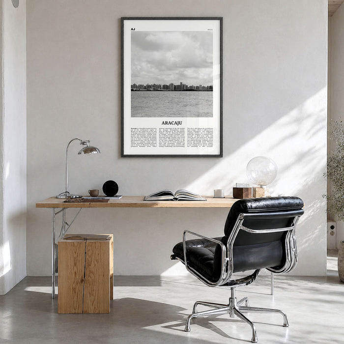 Aracaju Newspaper Poster in a black wood frame, hanging in a bright home office