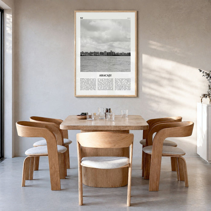 Aracaju Newspaper Poster in a natural wood frame, hanging in a dining room