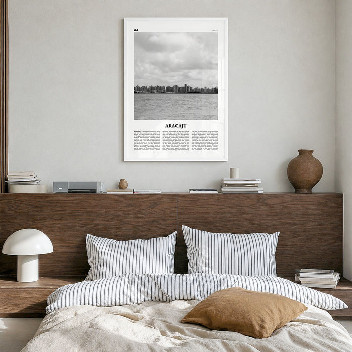Aracaju Newspaper Poster in a white wood frame, hanging in a bedroom