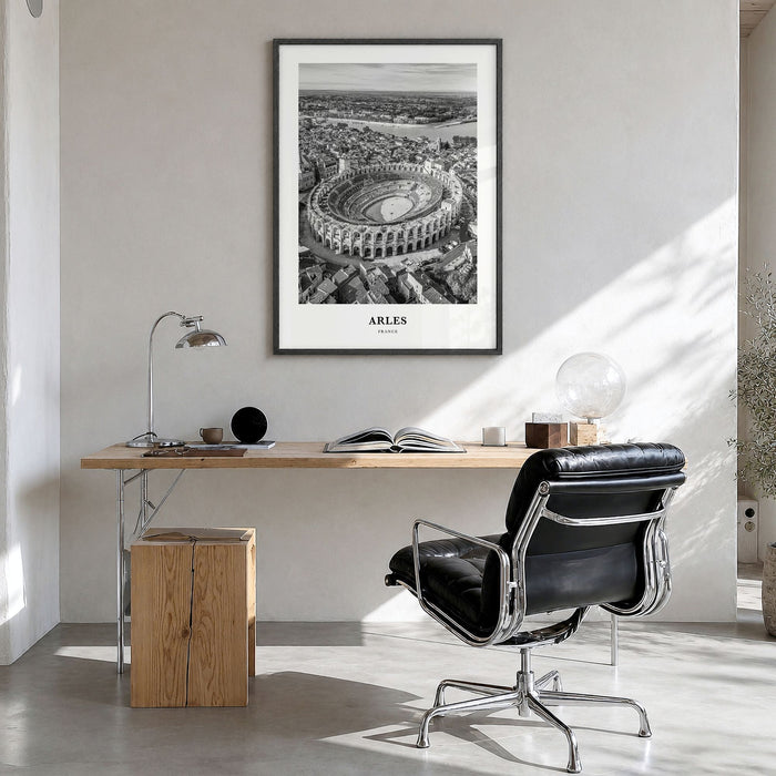 Arles Classic Poster in a black wood frame, hanging in a bright home office