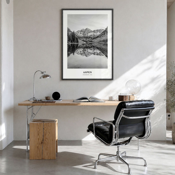 Aspen Classic Poster in a black wood frame, hanging in a bright home office