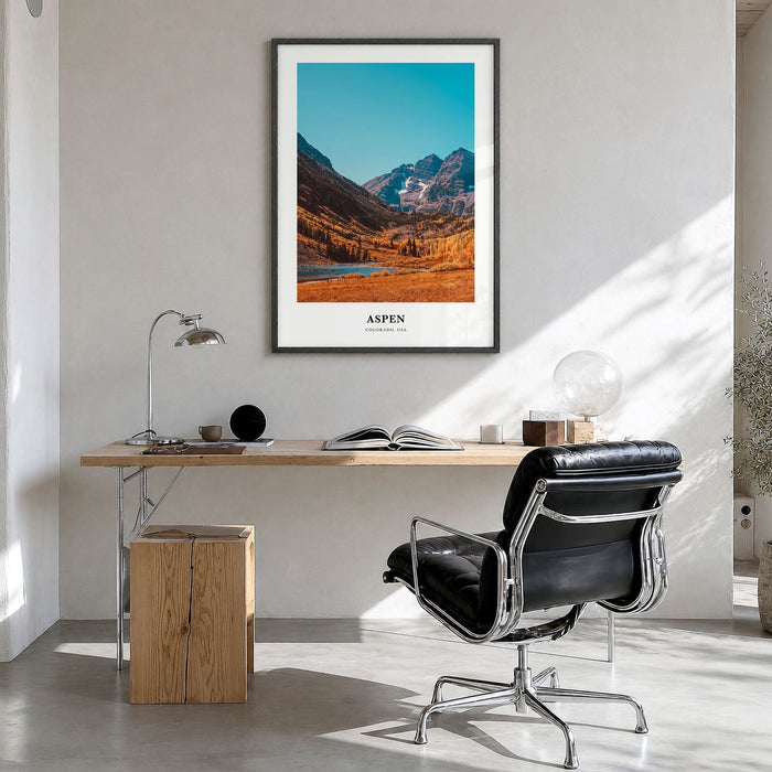 Aspen Classic Poster in a black wood frame, hanging in a bright home office