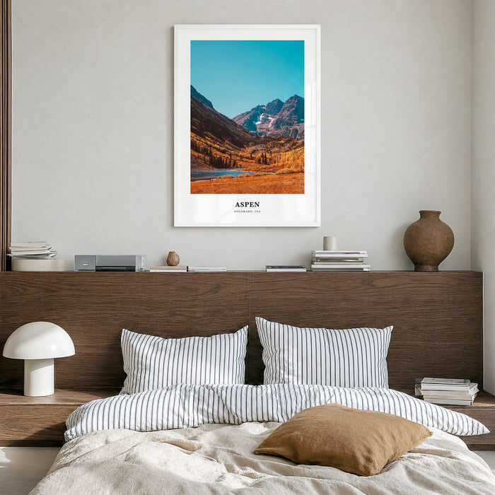 Aspen Classic Poster in a white wood frame, hanging in a bedroom