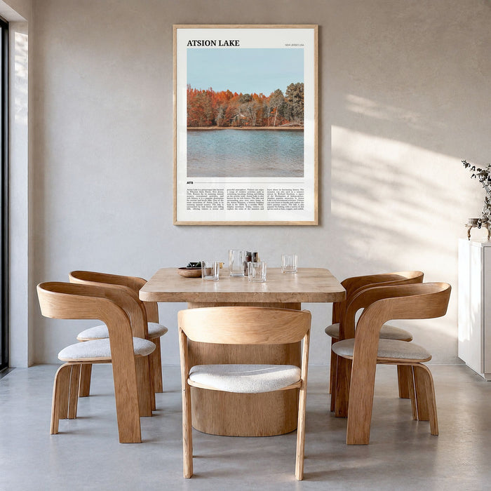 Atsion Lake Travel Poster in a natural wood frame, hanging in a dining room
