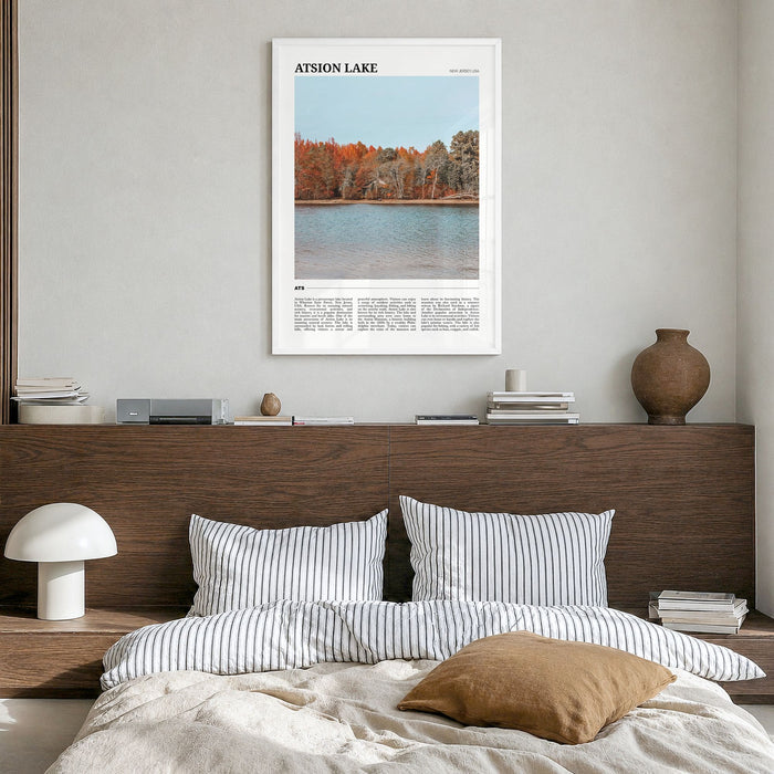 Atsion Lake Travel Poster in a white wood frame, hanging in a bedroom
