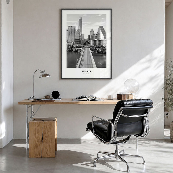 Austin Classic No 1 Poster in a black wood frame, hanging in a bright home office
