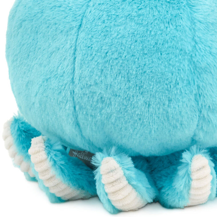 Soft blue octopus plush toy with a smiling face and curled tentacles, perfect for babies, toddlers, and ocean-loving kids.