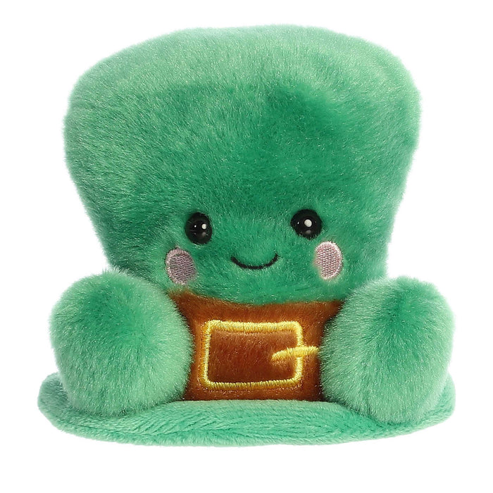 Finnigan Palm Pals plush leprechaun hat with green body, golden belt buckle, and cheerful smile—perfect for St. Patrick’s
