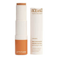 Oceanly eye concealer stick with packaging on a white background.