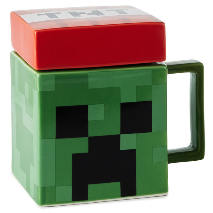 Square Minecraft Creeper mug with TNT lid that plays game sounds when lifted; green pixel design with red top.