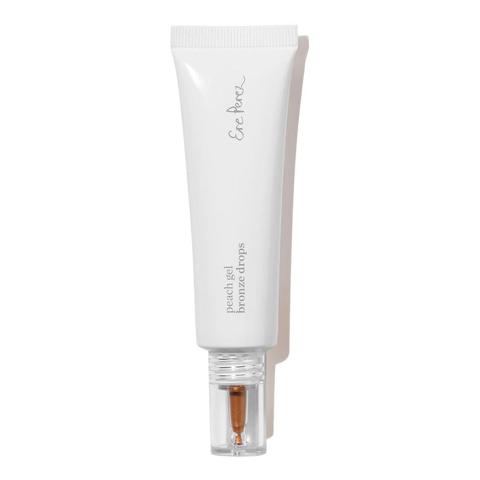 White Ere Perez Peach Gel Bronze Drops 30ml cosmetic tube with a clear cap.