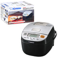 Zojirushi NL-BAC05-SB Silver Black Micom rice cooker shown with its matching carton, front LCD controls and fold-down carrying handle.
